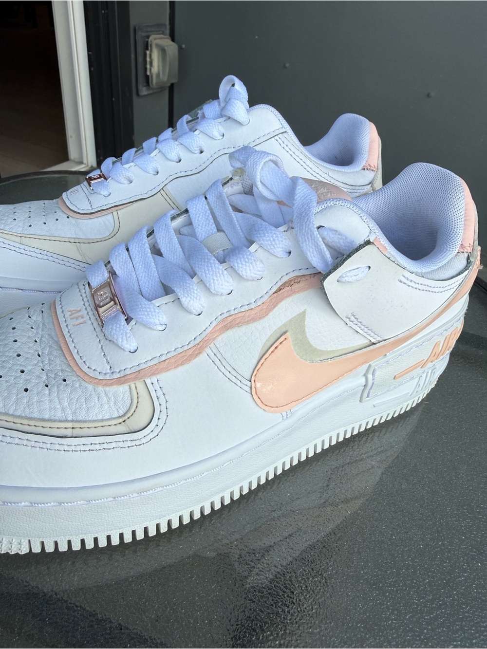 Nike Women’s White Sneakers with Pale Pink Accents
